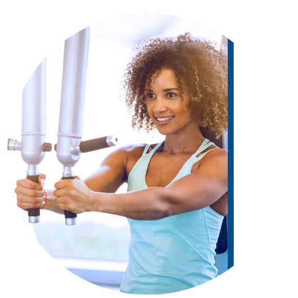 woman working out shoulders at gym