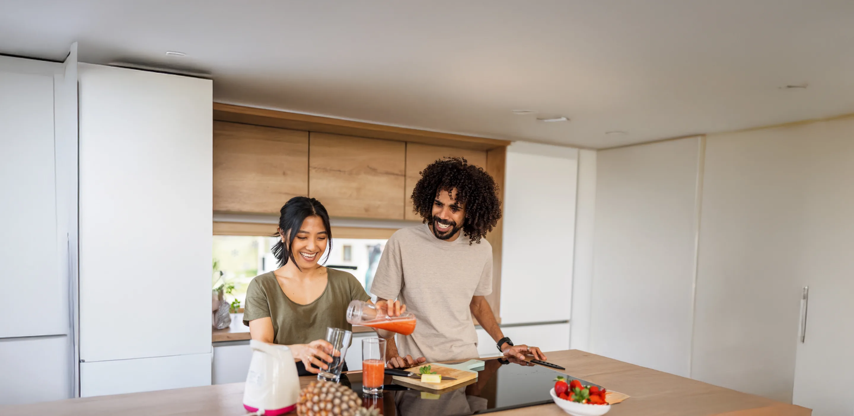 Couple making smoothie together