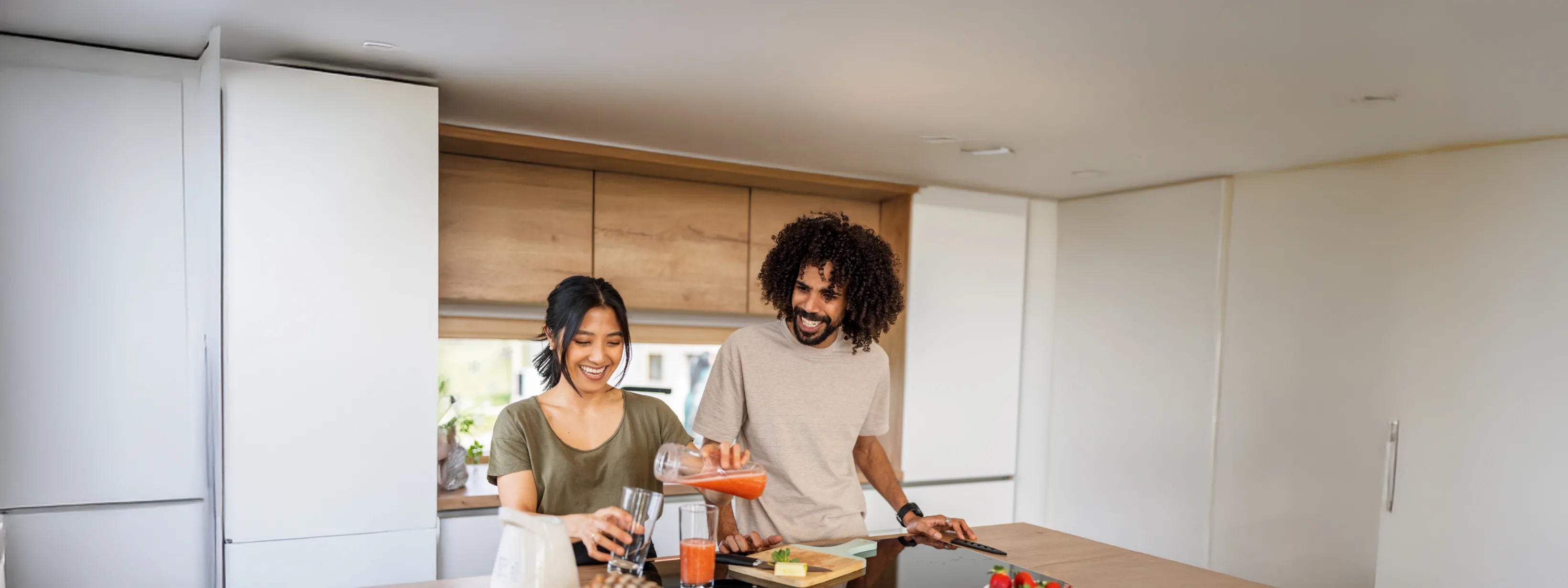 Couple making smoothie together