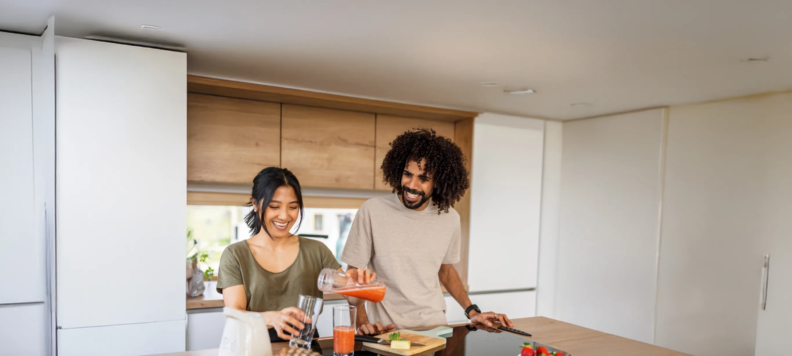 Couple making smoothie together